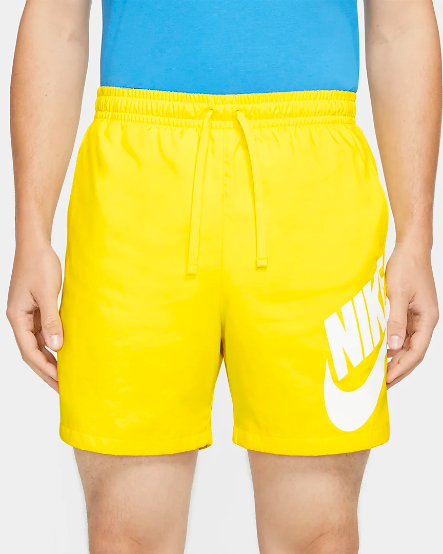 Nike yellow hotsell woven shorts